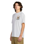 Person wearing a white t-shirt with a graphic design on a white background