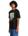 Person wearing a black t-shirt with a colorful graphic design on a white background