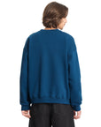 Person wearing a blue sweatshirt on a white background