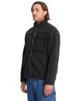 Man wearing a black jacket with a white background