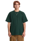 Person wearing a dark green t-shirt on a white background