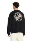 Person wearing a black sweatshirt with a white graphic design on the back, standing against a white background.