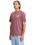 Man wearing a maroon t-shirt with a logo on a white background