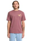 Man wearing a maroon t-shirt with a logo on a white background