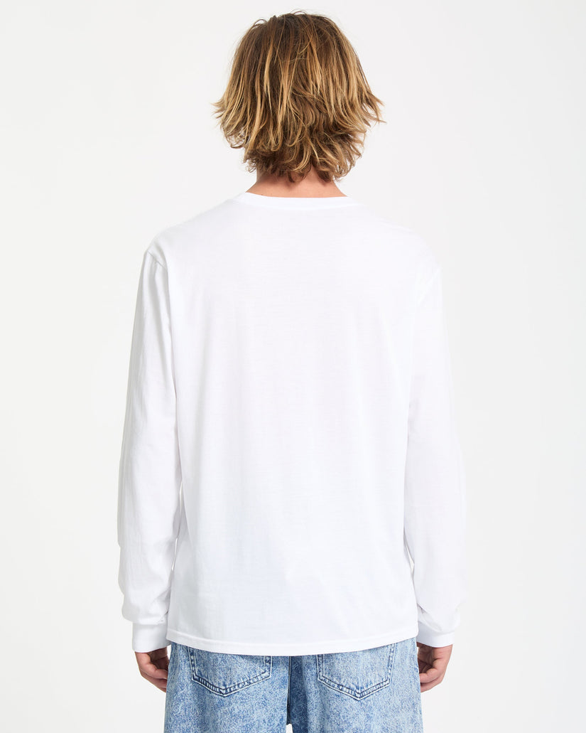 Person wearing a plain white long-sleeve shirt on a light gray background